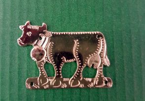 Ornament Motiv Kuh neusilber